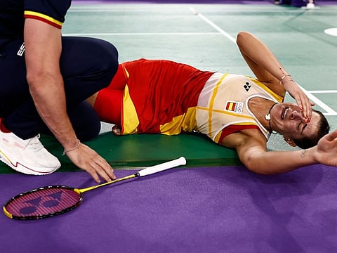 Spain's Carolina Marin is in tears during her women's singles badminton semi-final match against China's He Bing Jiao during the Paris 2024 Olympic Games at Porte de la Chapelle Arena in Paris on Sunday.