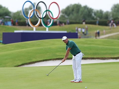 Ireland's Rory McIlroy putts in round 4 of the mens golf individual stroke play of the Paris 2024 Olympic Games at Le Golf National in Guyancourt, south-west of Paris on Sunday.