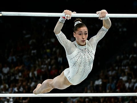 Algeria's Kaylia Nemour competes in the artistic gymnastics women's uneven bars final during the Paris 2024 Olympic Games at the Bercy Arena in Paris, on Sunday.