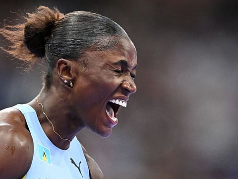 St Lucia's Julien Alfred celebrates after winning the women's 100m final at Paris 2024 Olympic Games at Stade de France on Saturday.