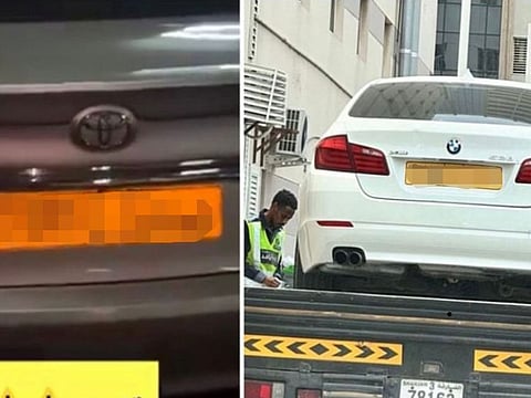The two cars bore the same number plate, one genuine and the other fake. The numbers have been blurred to protect the privacy of the man who complained to the police.