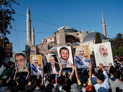 Pro-Palestinian demonstrators take part in a rally to condemn the assassination of Hamas leader Ismail Haniyeh, at Hagia Sophia Square in Istanbul, on August 3, 2024.
