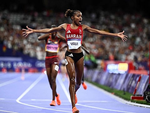 Bahrain's Winfred Mutile Yavi crosses the finish line ahead of Uganda's Peruth Chemutai o win the women's 3000m steeplechase final of the athletics event at the Paris 2024 Olympic Games at Stade de France in Saint-Denis, north of Paris, on Tuesday.