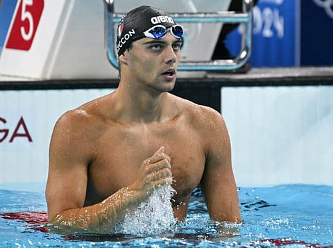 Italy's Thomas Ceccon reacts after winning the men's 100m backstroke final during the Paris 2024 Olympic Games.