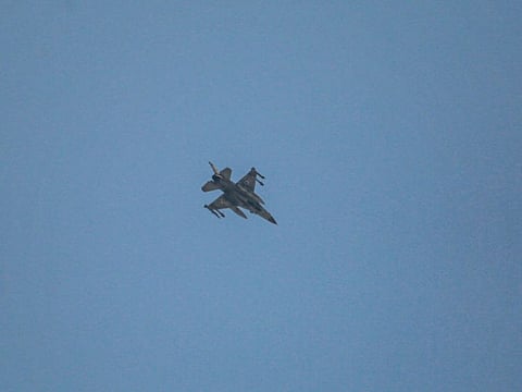 An Israeli army fighter jet releases fares above Khan Younis, in the southern Gaza Strip on July 24, 2024.