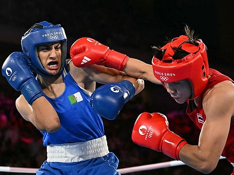 Thailand's Janjaem Suwannapheng and Algeria's Imane Khelif (Blue) compete in the women's 66kg semi-final boxing match.