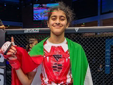 UAE’s Ghala Al Hammadi celebrates after defending her crown in the Junior 44kg at the IMMAF Youth World Championships.