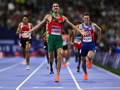 Morocco's Soufiane El Bakkali celebrates after winning the men's 3,000-metre steeplechase final at the Paris 2024 Olympic Games at Stade de France in Saint-Denis on Wednesday.