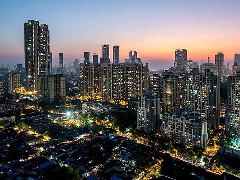 View of illuminated Mumbai city skyline at Sewari, Parel area. Mumbai continues to lead the real estate market in terms of contributing to India’s housing demand.