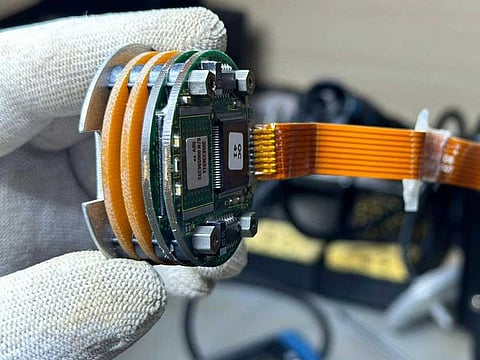 This handout picture released by the Brazilian Air Force shows part of the flight recorders, commonly known as black boxes, the cockpit voice recorder (CVR) and the flight data recorder, which are being analyzed at the Analysis Laboratory of the Investigation and Prevention of Aeronautical Accidents (CENIPA) in Brasilia on August 10, 2024.