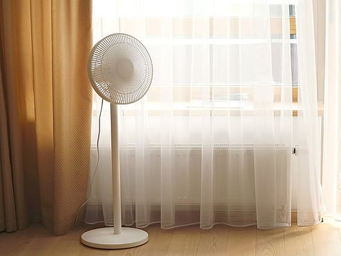 A pedestal or standing fan can circulate air efficiently in any room, leaving it cooler without drastically raising your electricity bills.