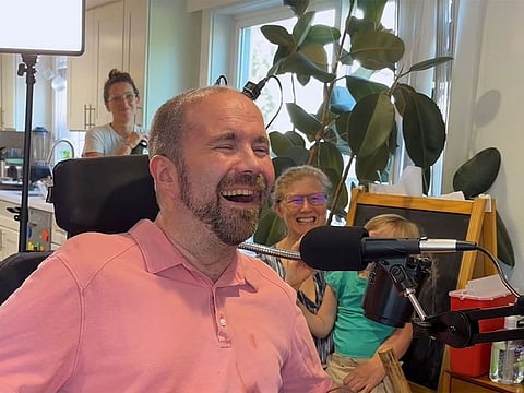 Casey Harrell and observers react as a brain-computer interface system works on the first attempt.