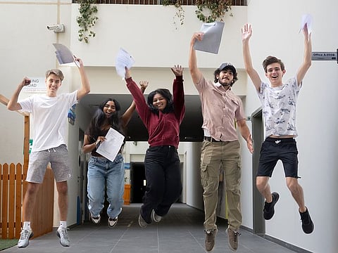 GEMS Metropole School Motor City students celebrate their A level results in Dubai on Thursday.