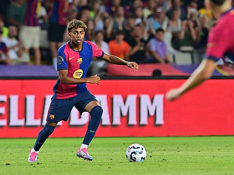 Spanish forward Lamine Yamal, a product of Barcelona youth academy, carries the hopes of the Catalan club in the new season.
