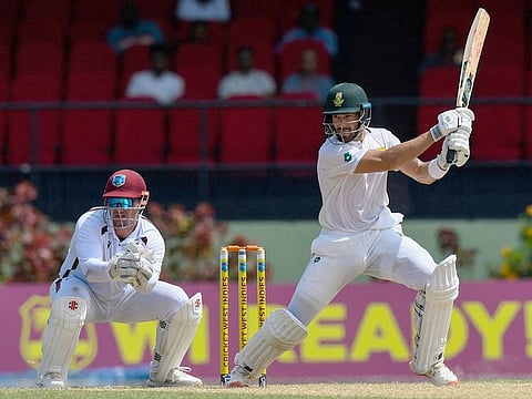 Aiden Markram (R) of South Africa hits 4 as Joshua Da Silva (L) of West Indies watches during Day 2 of the 2nd Test match at Guyana National Stadium in Providence, Guyana, on August 16, 2024.