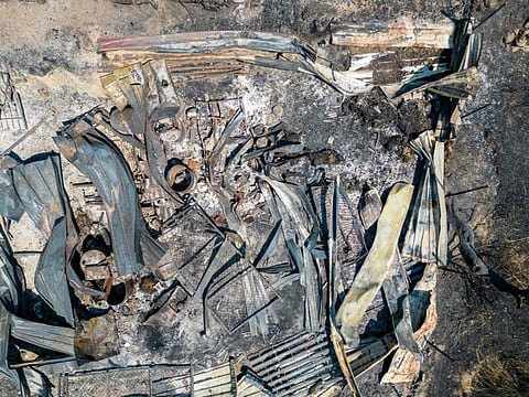 This aerial photograph shows a burnt barn following a wildfire in the Sancakli village, in Turkey's western province of Izmir on August 18, 2024.