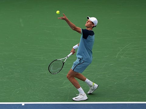 Jannik Sinner of Italy serves during his match against Alexander Zverev of Germany during Day 8 of the Cincinnati Open at the Lindner Family Tennis Center on Sunday.