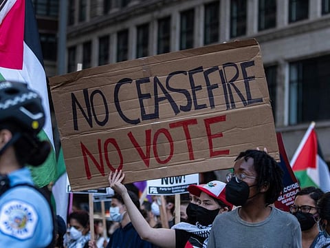 Pro-Palestine protesters march ahead of the Democratic National Convention on August 18, 2024 in Chicago, Illinois.