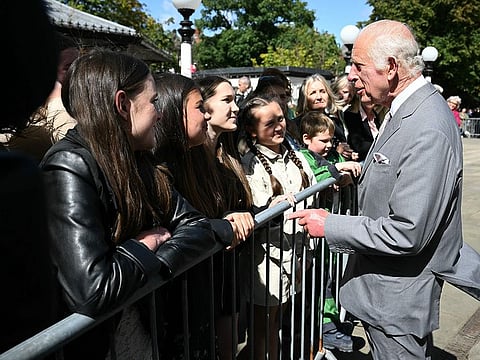Britain's King Charles III meets with members of the local community following the July 29 attack at a childrens' dance party, during his visit to the Town Hall in Southport, northwest England, on August 20, 2024.