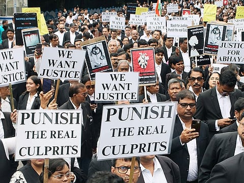 Advocates stage a protest demanding justice for the victim of Kolkata's RG Kar Hospital Tragedy, in Kolkata on Monday