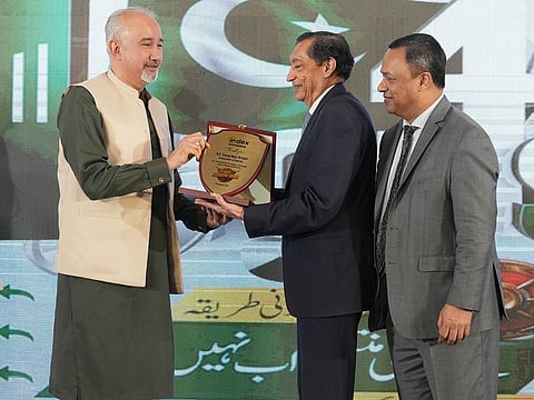 Pakistan Ambasador Faisal Niaz Tirmizi (left) with Humayun Murad (2nd left) and Syed Abdus Salam at the ceremony held in Dubai to celebrate successful awareness campaign to educate expats about illegal remittances.