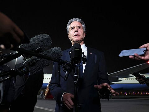 US Secretary of State Antony Blinken speaks to reporters on the tarmac in Doha on August 20, 2024.