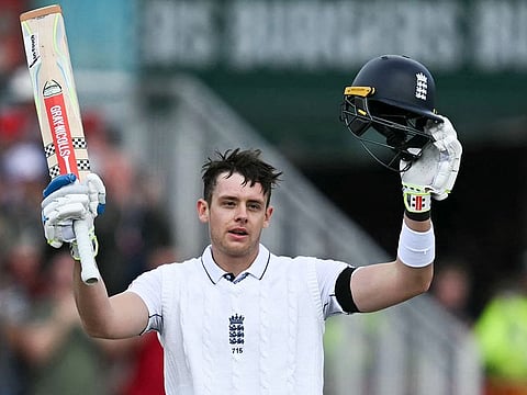 England's Jamie Smith celebrates his maiden century on day three of the first Test cricket match against Sri Lanka at Old Trafford cricket ground in Manchester, north-west England on August 23, 2024.