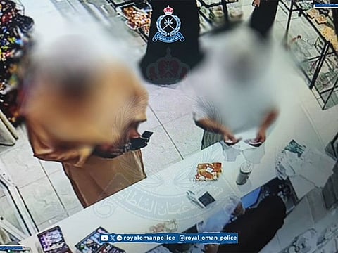 Two individuals were arrested for shop defrauding after CCTV footage revealed their tactics.