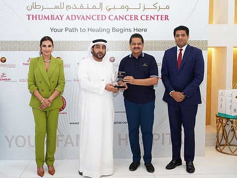 Dr Thumbay Moideen (2nd right) presenting memento to Hamad Obaid Taryam Al Shamsi. Akbar Thumbay Moideen (Right) also attended the inaugural ceremony of Thumbay Advanced Cancer Centre in Ajman.