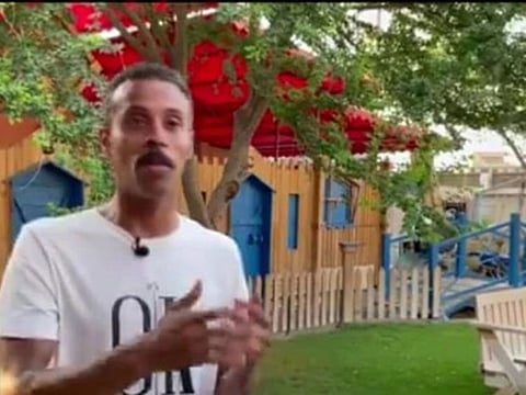 Saudi artist Ali Al Ashur showcases wooden artworks on farm.