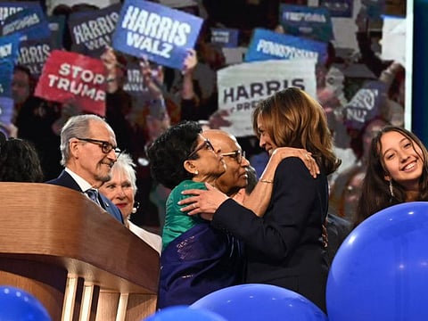 Kamala Harris greets relatives on the fourth and last day of the Democratic National Convention at the United Center in Chicago, Illinois, on August 22, 2024.