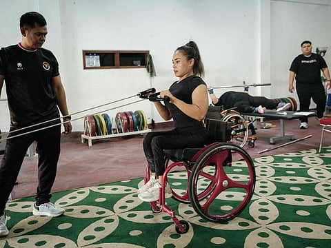 Indonesian para powerlifter Ni Nengah Widiasih trains during the national team's training camp at the Kusuma Sahid Prince Hotel in Surakarta, Central Java.