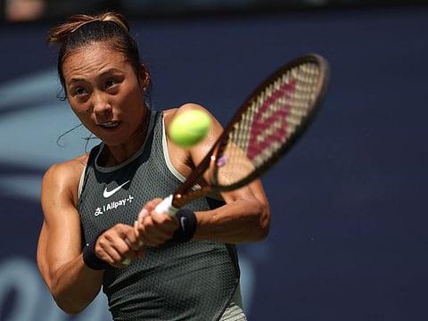 Qinwen Zheng of China returns against Amanda Anisimova of the United States during their Women's Singles First Round match on Day One of the 2024 US Open at the USTA Billie Jean King National Tennis Center on Monday.