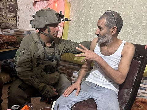 Freed Israeli hostage Kaid Alkadi with the commander of the 162nd Division BG Itzik Cohen after his rescue at an undisclosed location in the southern Gaza Strip.