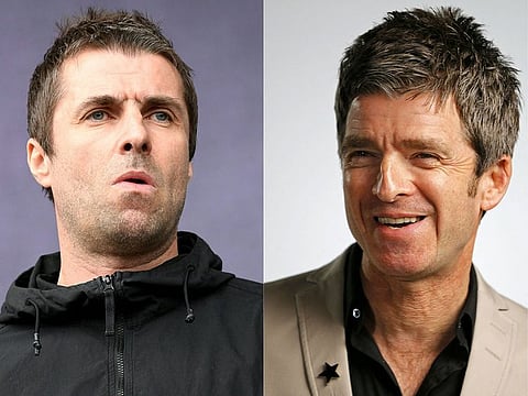 British singer Liam Gallagher (L) performing, July 20, 2018; and (FILES) Noel Gallagher at the 2018 Mercury Music prize awards ceremony, September 20, 2018.