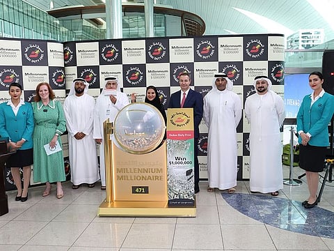 Officials from the Dubai Duty Free during the Dubai Duty Free Millennium Millionaire draw on Wednesday at the Dubai International Airport.