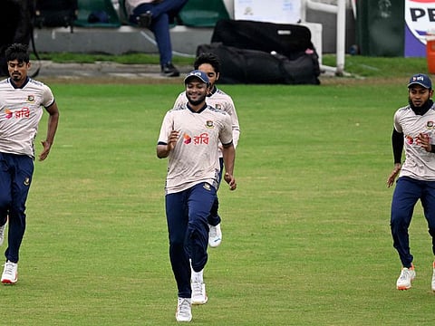 Bangladesh's Shakib Al Hasan (centre), Mushfiqur Rahim (right) and Taijul Islam attend a training session at the Rawalpindi Cricket Stadium in Rawalpindi on Wednesday.