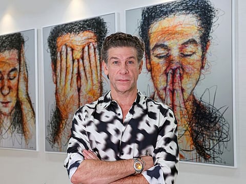 A man of many interests: Dr Adel Quttainah at the Quttainah Specialised Hospital in Dubai. A well-known plastic surgeon, he says he sources his collection of medical antiques, art and supercars from different parts of the world.