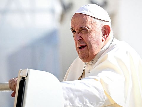 Pope Francis arrives to lead his weekly general audience on St. Peter's square in Vatican City on August 28, 2024.
