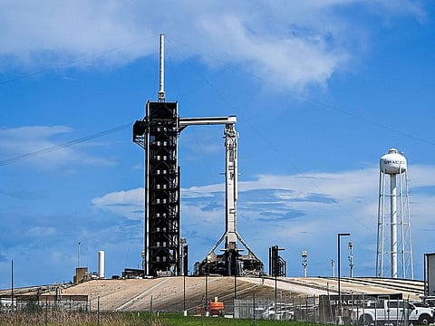 A SpaceX Falcon 9 rocket with the Crew Dragon Resilience capsule sits on Launch Complex 39A at Kennedy Space Center ahead of the Polaris Dawn Mission in Cape Canaveral, Florida.