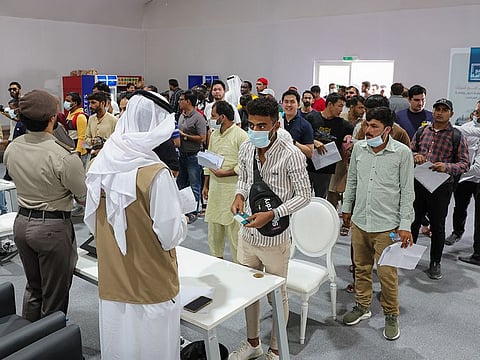 Amnesty applicants queue up at a GDRFA counter in Al Awir on the second day of Amnesty programme.