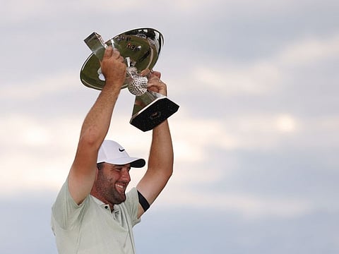 Scottie Scheffler celebrates his triumph