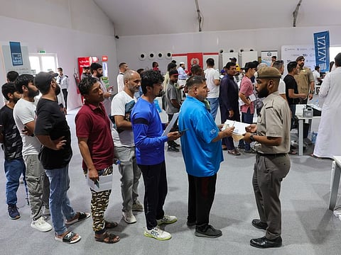Amnesty seekers at a GDRFA counter in Al Awir Centre in Dubai