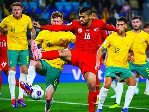 Bahrain's Sayed Baqer competes for the ball during the 2026 Fifa World Cup AFC qualifiers football match against Australia at Cbus Super Stadium on the Gold Coast on Thursday.