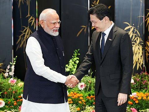 Prime Minister Narendra Modi exchanges greetings with Singapore Prime Minister Lawrence Wong during the exchange of a Memorandum of Understanding (MoU) between India and Singapore, in Singapore on Thursday