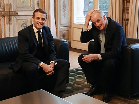 French president Emmanuel Macron with Michel Barnier in a file photo.