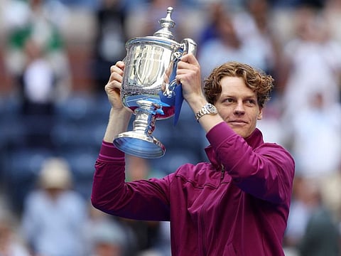 Jannik Sinner of Italy celebrates with the winners trophy after defeating Taylor Fritz of the United States to win the men's singles final of the 2024 US Open at USTA Billie Jean King National Tennis Centre on Sunday.