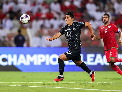 South Korea's forward Hwang Hee-chan runs after the ball during the 2026 Fifa World Cup Asian qualification football match against Oman at Sultan Qaboos Sports Complex in Muscat on Sunday.