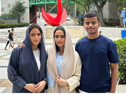 Talented Emirati students Rashed Al Shamsi with his twin sisters Sara Al Shamsi and Wadima Al Shamsi.