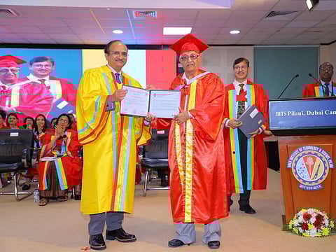 Dr Pankaj Manubhai Vyas, 75, receiving his doctorate degree from BITS Pilani Vice-Chancellor V. Ramgopal Rao in Dubai on Sunday.